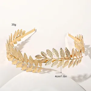 Detail of golden metal laurel leaf headband showing weight 35g and leaf height 4cm