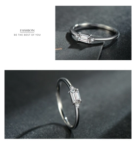 Macro shot of S925 silver ring featuring baguette-cut zircon and minimalist slim band
