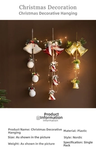Close-up of white flocked and gold embossed Christmas bells with warm LED string lights