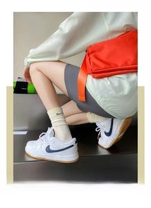 Detail view of ribbed cotton crew socks in beige featuring breathable soft fabric