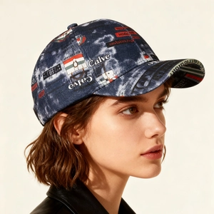 Hip hop denim baseball cap with graffiti prints and stripes worn by a female model