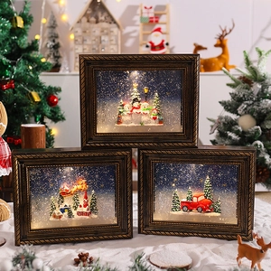 Christmas frame music box with snowman and santa motifs, warm glowing festive decoration