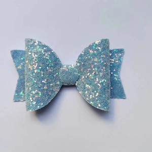 Sparkly blue glitter bow accessory for straw cups with a creative stylish finish