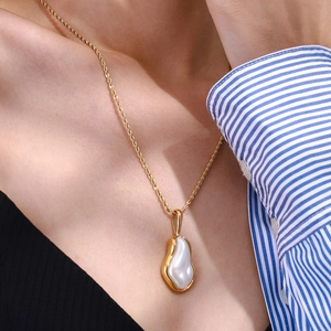 Minimalist gold twisted rope necklace with organic shaped pearl pendant for women