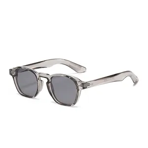 Classic round frame sunglasses with grey lenses and translucent taupe frames for men