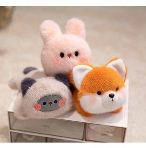 Detailed plush texture of cute stuffed animals including pink rabbit and orange fox dolls