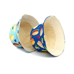 Kids cotton sun hats with colorful macaron and dessert prints in blue and light blue colors