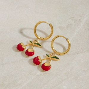 18K gold plated stainless steel hoop earrings with red enamel cherry charms on marble
