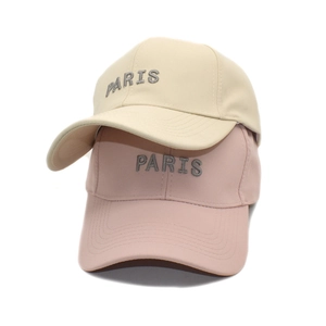 Classic cotton baseball caps in beige and pink with embroidered Paris text logo