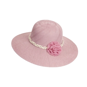 Detail of pink wide brim straw hat with white braided band and chiffon rose flower