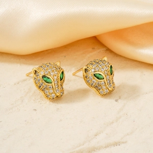 Boucles d'oreilles léopard dorées de luxe avec micro-pavage de zircons et yeux verts