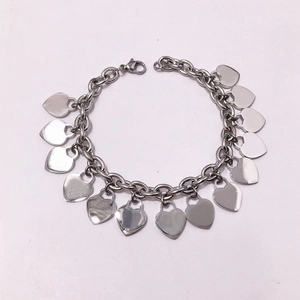 Silver stainless steel chunky chain bracelet with multiple heart-shaped pendants on white backdrop