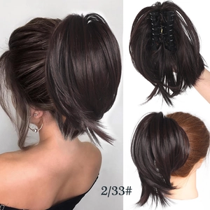 Detailed views of dark brown wavy ponytail hairpiece with secure claw clip attachment
