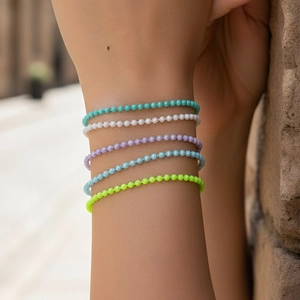 Bohemian colorful beaded elastic bracelet set with five vibrant painted copper strands