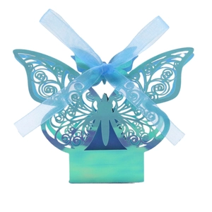 Detail of laser-cut butterfly candy box with iridescent blue finish and wide ribbon bow
