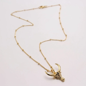 Gold bull horn crescent moon necklace with black zircon on satellite bead chain