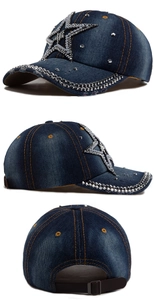 Detailed view of the denim baseball cap showing rhinestones and metal rivets decoration