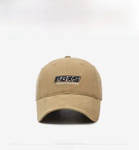 Front view of khaki cotton baseball cap with FBXS 3D embroidery and slogan details