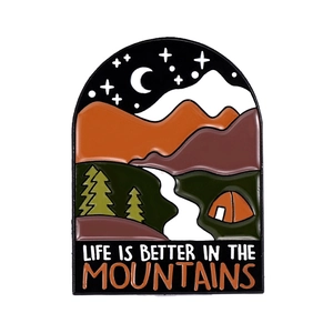 Detailed enamel pin with mountains and tent featuring Life is Better in the Mountains text
