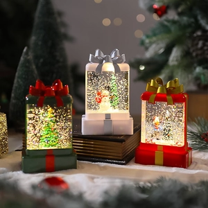 Luminous Christmas gift box snow globe set with Santa and snowman LED decor