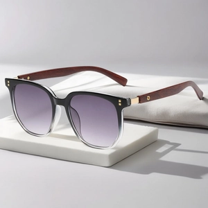 Retro polygon sunglasses with gradient black frame and wood grain textured temples