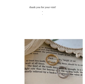Detail of vintage twisted texture hoop earrings in gold and silver finishes