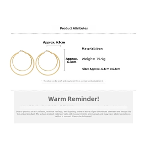 Detailed view of large gold-tone layered hoop earrings with weight and size measurements