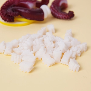 Miniature PVC faux white squid chunks with detailed cross-cut patterns for DIY crafts