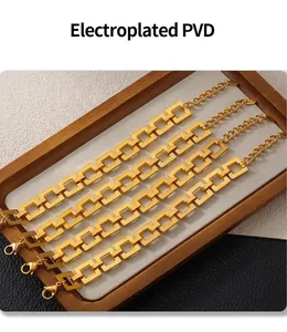 Detail of four gold-plated hollow square link bracelets on a beige velvet tray display