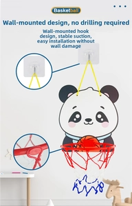 Detail view of cartoon panda basketball backboard with wall-mounted hooks and red hoop