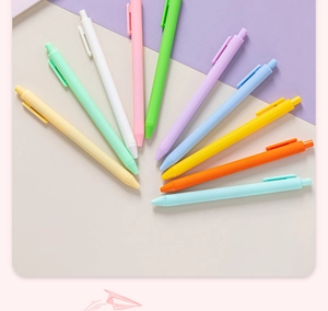 Detailed fan arrangement of colorful matte click pens in vibrant macaron shades