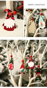 Detail of wooden Christmas gnome pendants with checkered hats and rustic twine ropes
