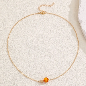 Détail du collier de baseball doré avec cœur, fermoir mousqueton et chaîne de réglage