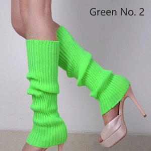 Close-up of neon green ribbed knit leg warmer with elastic texture and ruched style