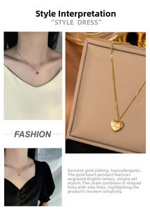 Detail of 18K gold plated heart pendant necklace with Love engraving and dual chain style