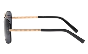 Detail of gold metal temples with embossed check pattern on stylish men's sunglasses