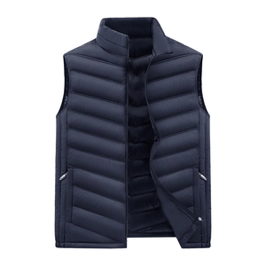 Men's navy blue lightweight quilted vest with stand collar and zipper pockets