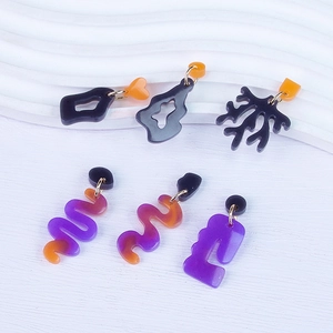 Irregular geometric resin drop earrings in purple and orange with acrylic metal links