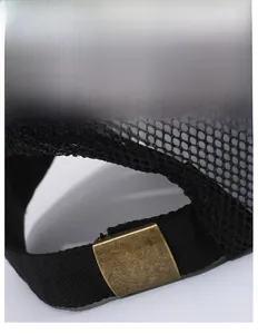 Detail of adjustable brass buckle on black breathable mesh baseball cap for men