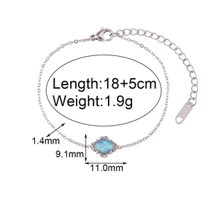 Vue détaillée du bracelet en argent avec pendentif opale bleue, dimensions et poids inclus