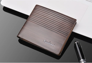 Detailed view of deep brown bifold men's wallet with textured panels and silver logo