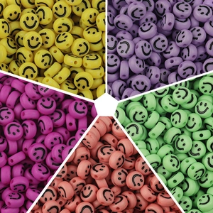 Detailed close-up of colorful smiley face acrylic beads for DIY jewelry making