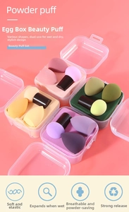 Macro view of multi-colored makeup sponge set with handle in a transparent case