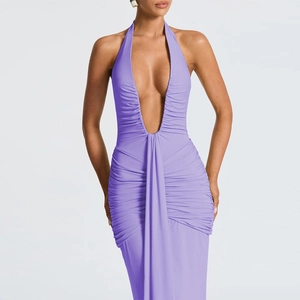 Detail of elegant purple halter neck dress with deep V-neckline and pleated elastic fabric