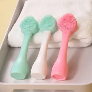 Three-color double-sided silicone face cleansing brushes on tray for skin care
