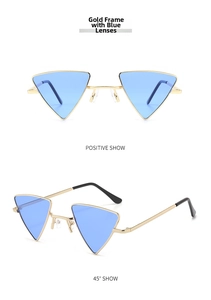 Detail view of gold frame triangle sunglasses with light blue lenses and metal temples