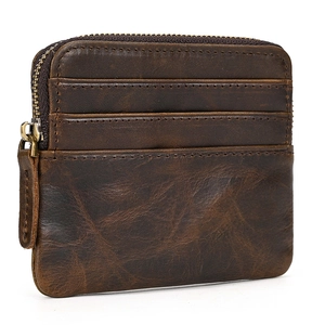 Detail view of vintage dark brown crazy horse leather wallet with durable metal zipper