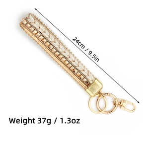 Detail view of woven beaded wristlet keychain with dimensions 24cm and weight 37g
