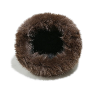 Top-down macro shot showing thick dark brown faux fur texture of the winter beanie