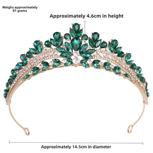 Close-up of emerald crystal bridal tiara with gold alloy base and waterdrop gems